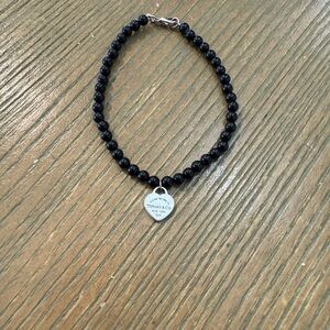 Tiffany & Co. 925 silver mini RTT heart pendant black onyx bracelet.